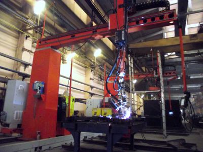 Welding robot with laser seam-tracking system